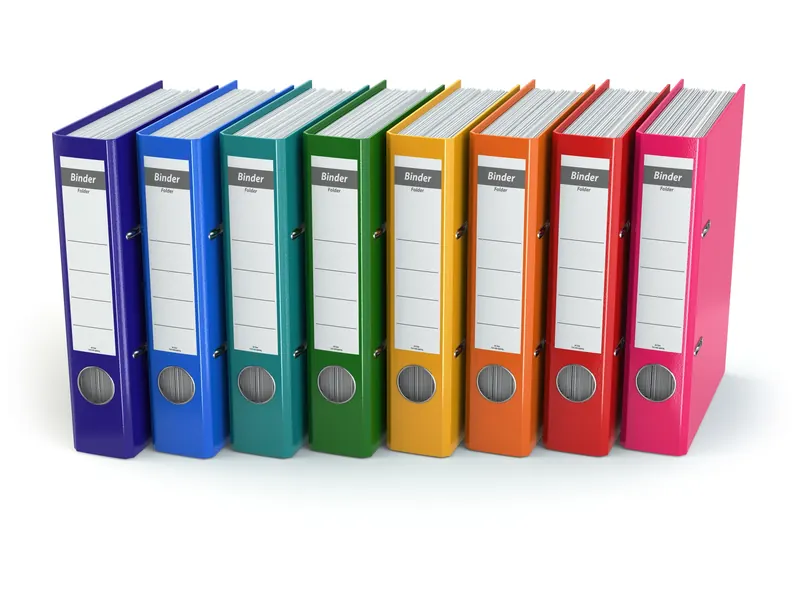 A row of policy binders