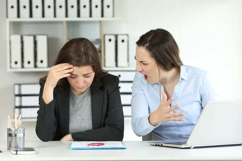 An investigator interviewing an upset employee
