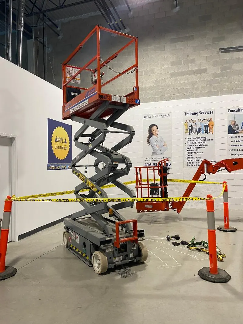 A scissor lift and boom lift set up for training at the Concord centre