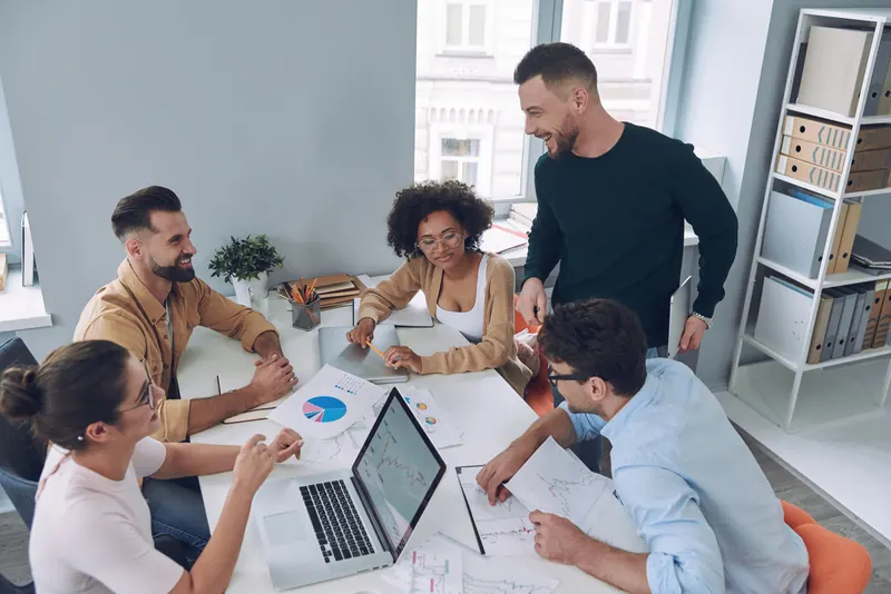 An HR team meeting around a table