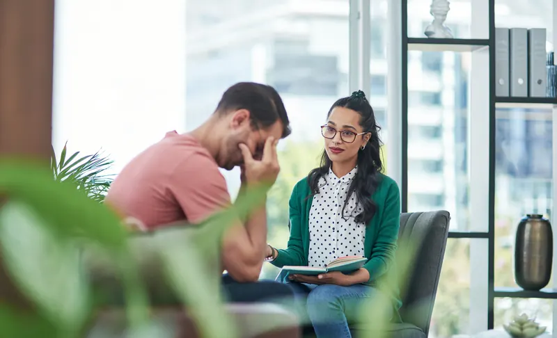 Two colleagues in a difficult conversation